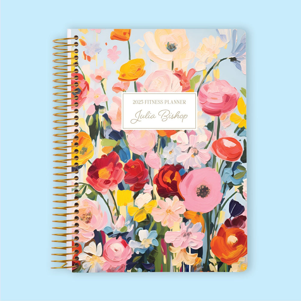 Fitness planner with a Blossom Dreams Colorful cover, featuring vibrant floral art to inspire your workouts, goal-setting, and wellness routine.