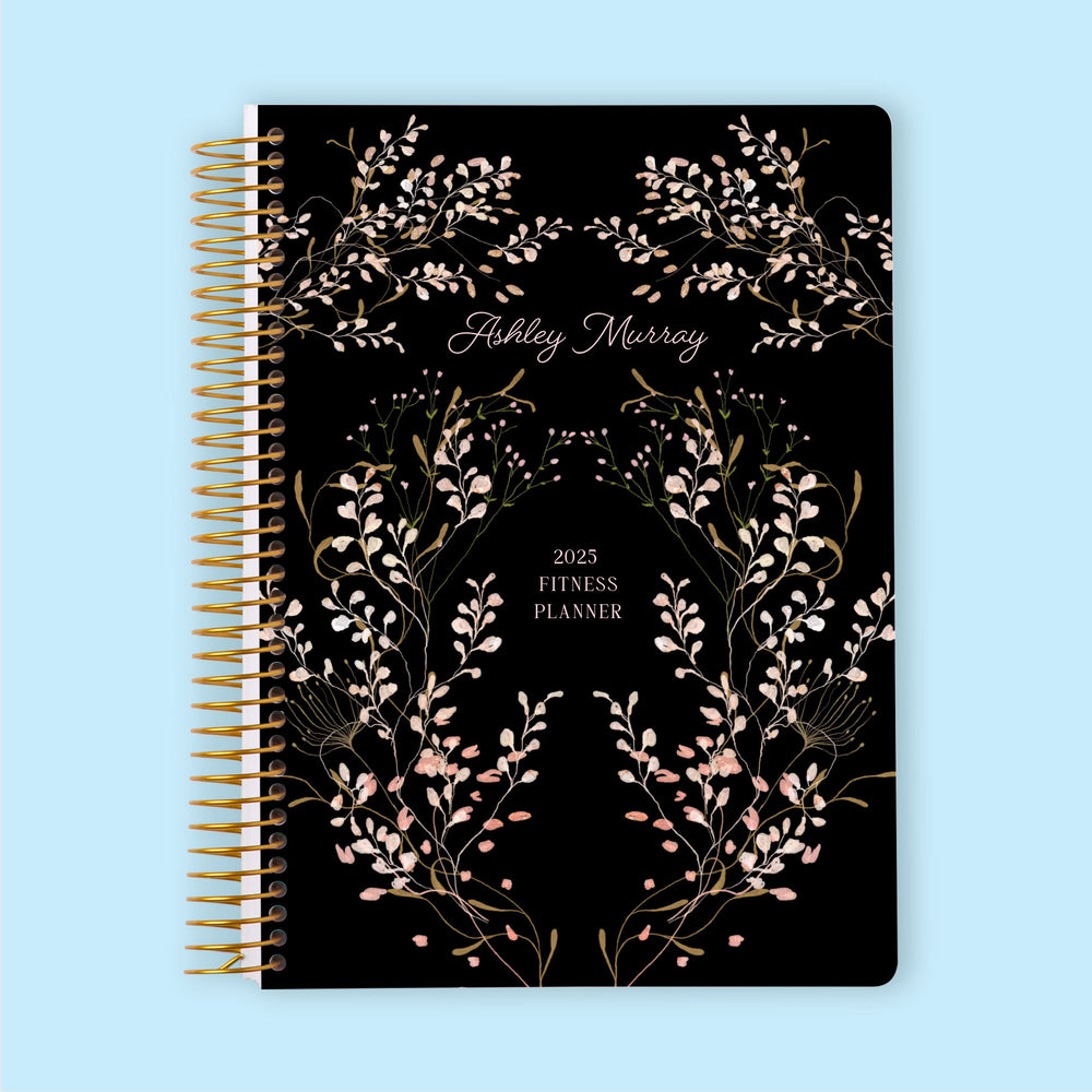 Fitness planner with a Flower Frame Pink cover, combining soft florals with structured planning to track workouts, meals, and progress.