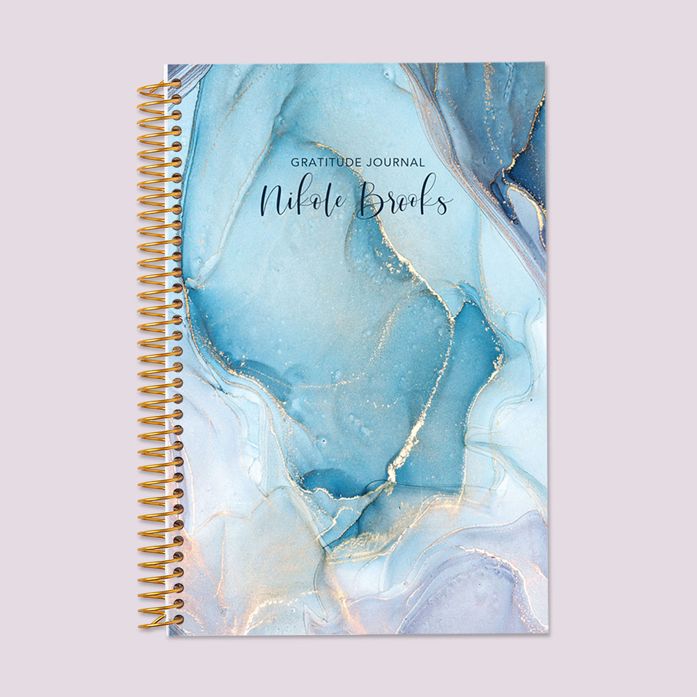 Gratitude journal with an Aqua Gold Abstract Ink cover, blending artistic design with space for gratitude journaling and self-reflection.