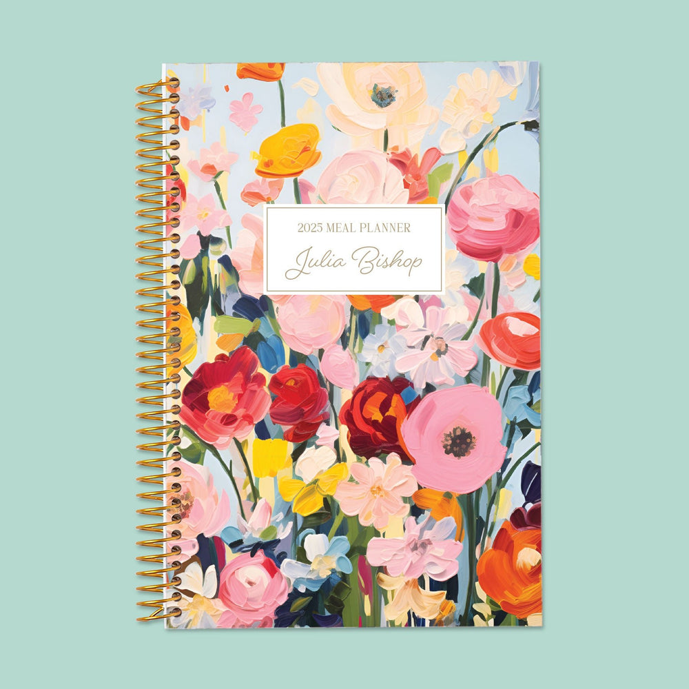 6x9 meal planner with a Blossom Dreams Colorful cover, featuring structured meal tracking, grocery lists, and premium paper for seamless meal organization.