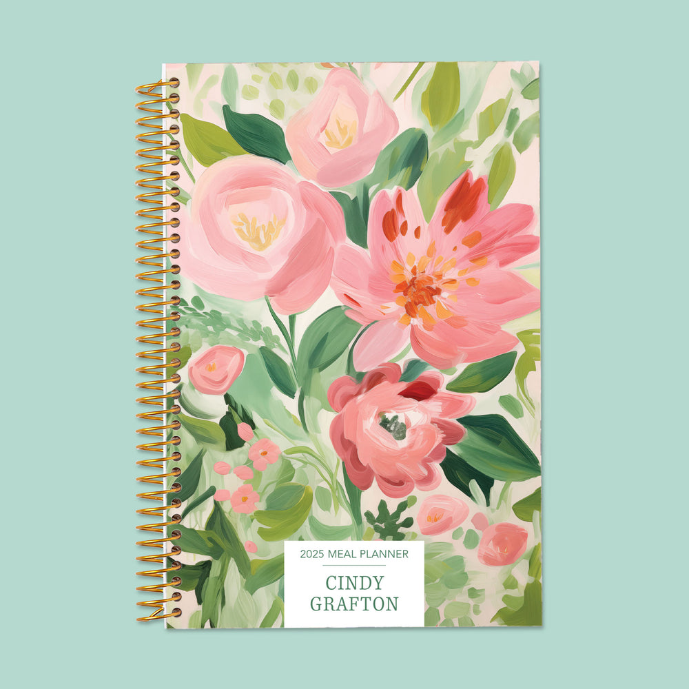 6x9 meal planner with a Blossom Dreams Pink Green cover, perfect for meal prep, grocery planning, and tracking nutrition with a stylish floral design.