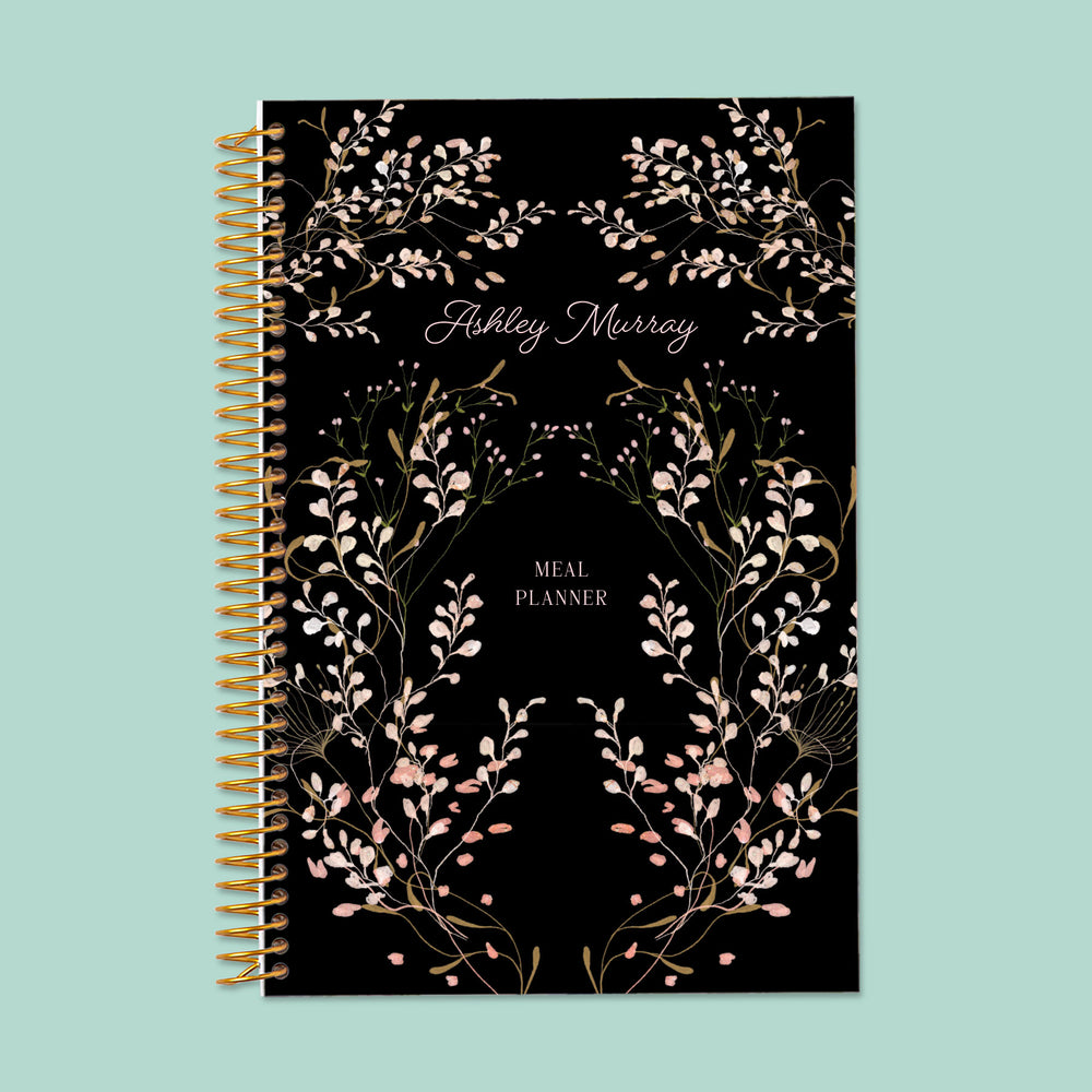 6x9 meal planner with a Flower Frame Pink cover, featuring structured meal logs, grocery lists, and dietary tracking for an organized and stress-free kitchen routine.
