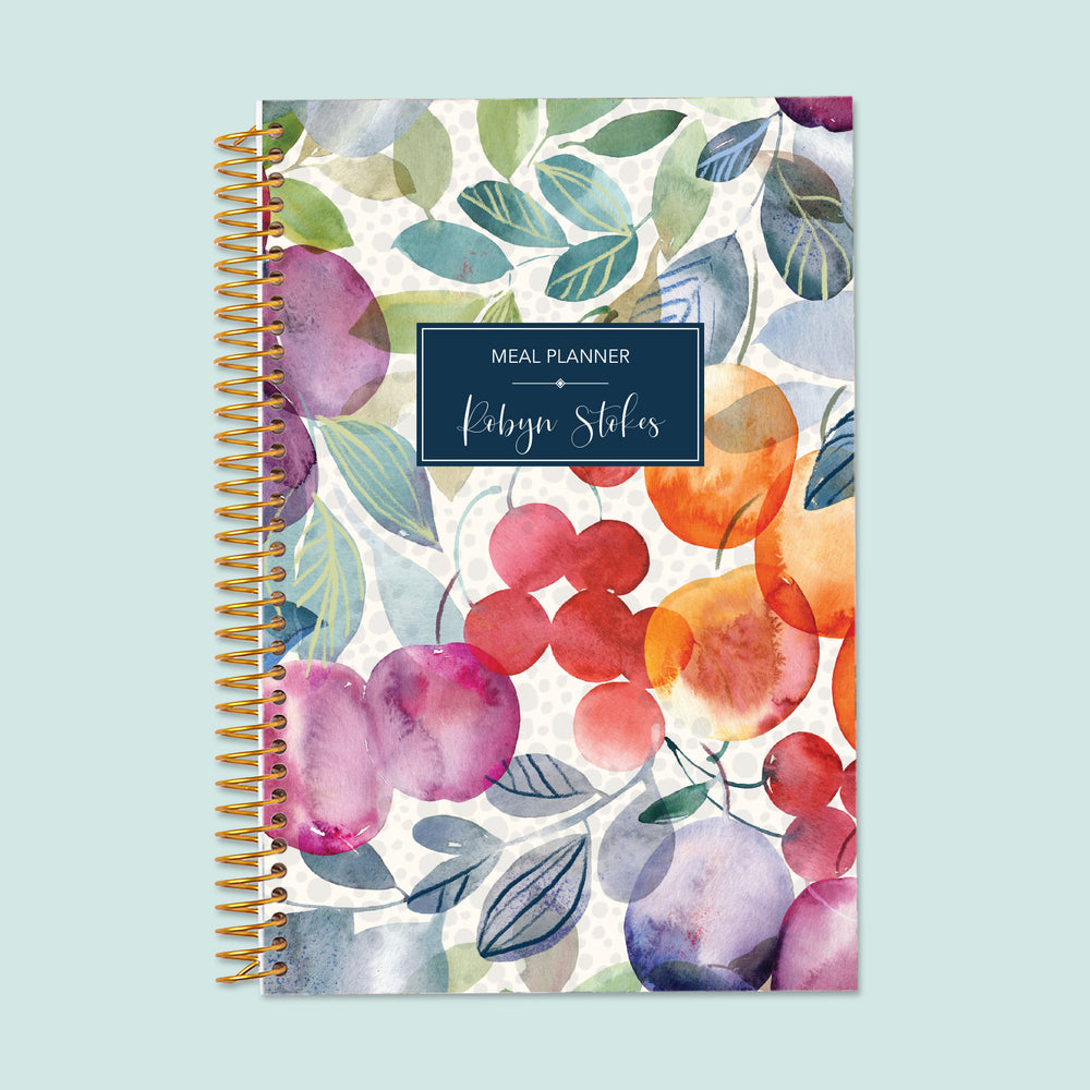 6x9 meal planner with a Fruit-inspired cover, featuring beautifully designed pages to plan meals, create grocery lists, and track food expenses effortlessly.