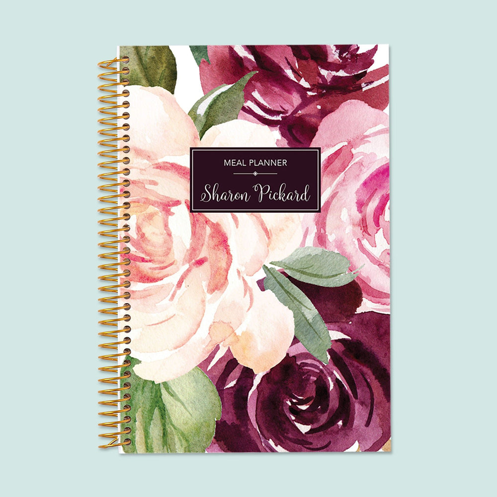 6x9 meal planner with a Plum Blush Roses cover, featuring thoughtfully designed pages for easy meal prep, grocery budgeting, and tracking food intake.