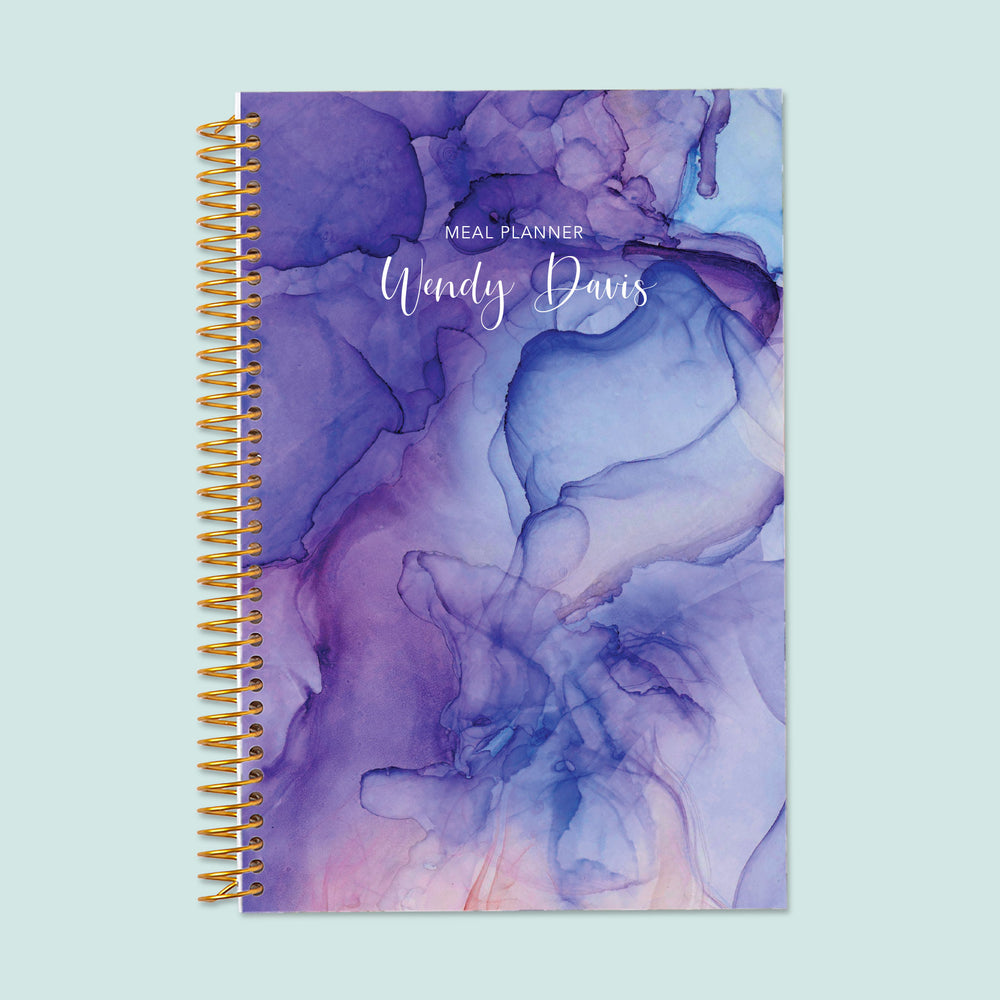 6x9 meal planner with a Purple Flowing Ink cover, offering a visually stunning layout for meal tracking, food prep planning, and organized grocery lists.