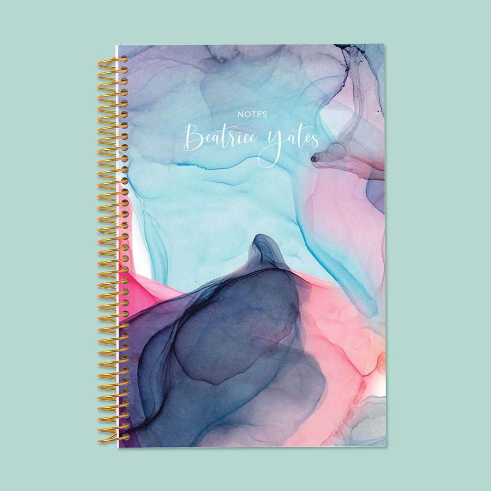 Bright and colorful rainbow flowing ink notebook, perfect for capturing ideas, journaling, and creative brainstorming.