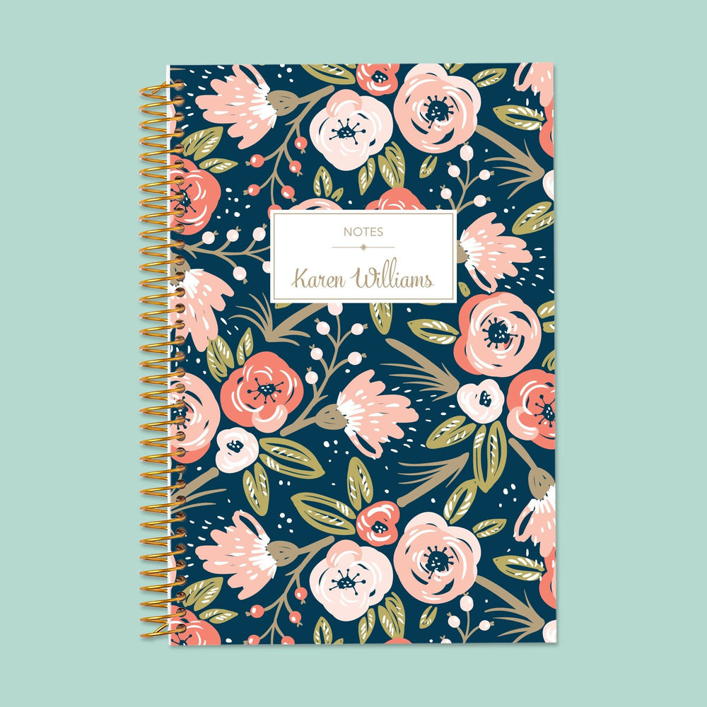 Elegant lined notebook with a navy pink gold floral cover, premium smooth pages, and durable spiral binding—perfect for journaling, planning, and notes.
