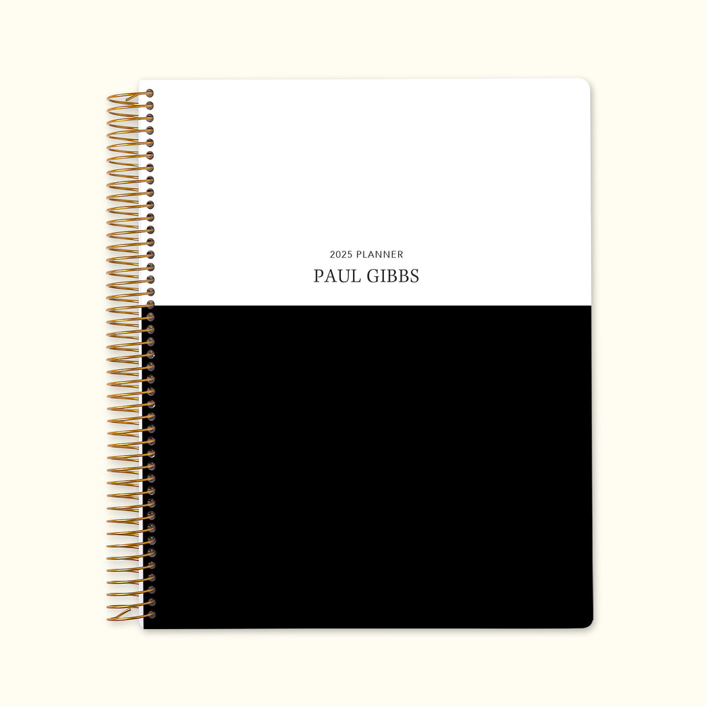 8.5x11 monthly planner with a bold black and white color block cover, combining modern minimalism with premium paper and well-structured monthly pages for planning ease.