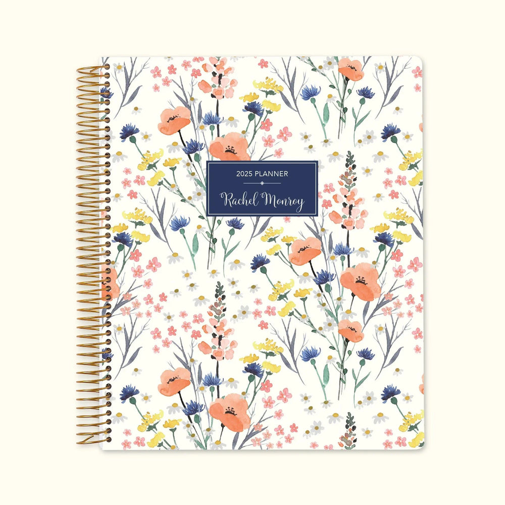 8.5x11 monthly planner with a charming field flowers blue cover, featuring delicate wildflowers, premium writing paper, and structured monthly spreads for an effortless organization.