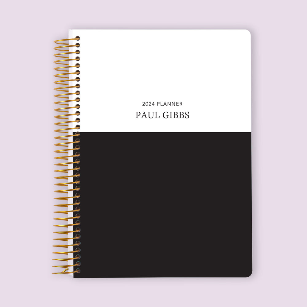 Self-care planner with a Black White Color Block cover, a modern take on self-care planning with space for goals, affirmations, and habits.