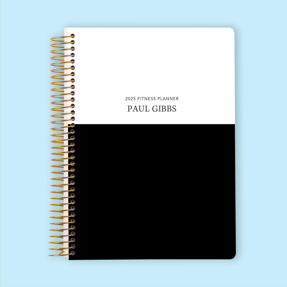 Fitness planner with a Black White Color Block cover, a structured and stylish planner for organizing workouts and self-care.