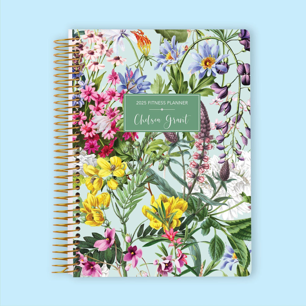 Fitness planner with a Colorful Florals Green cover, offering stylish and functional organization for health and wellness goals.