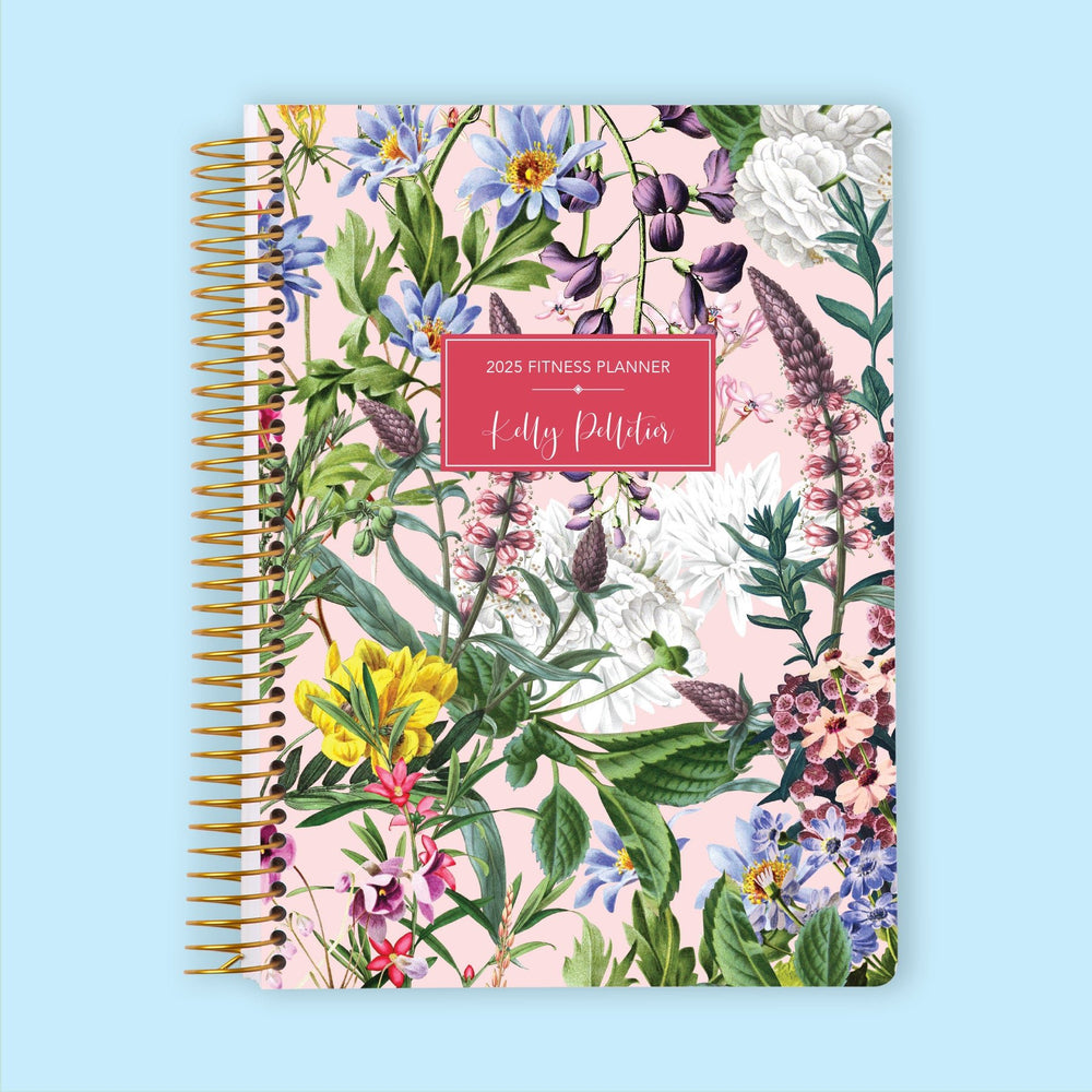 Fitness planner with a Colorful Florals Pink cover, helping you manage workouts, self-care, and wellness habits with ease.