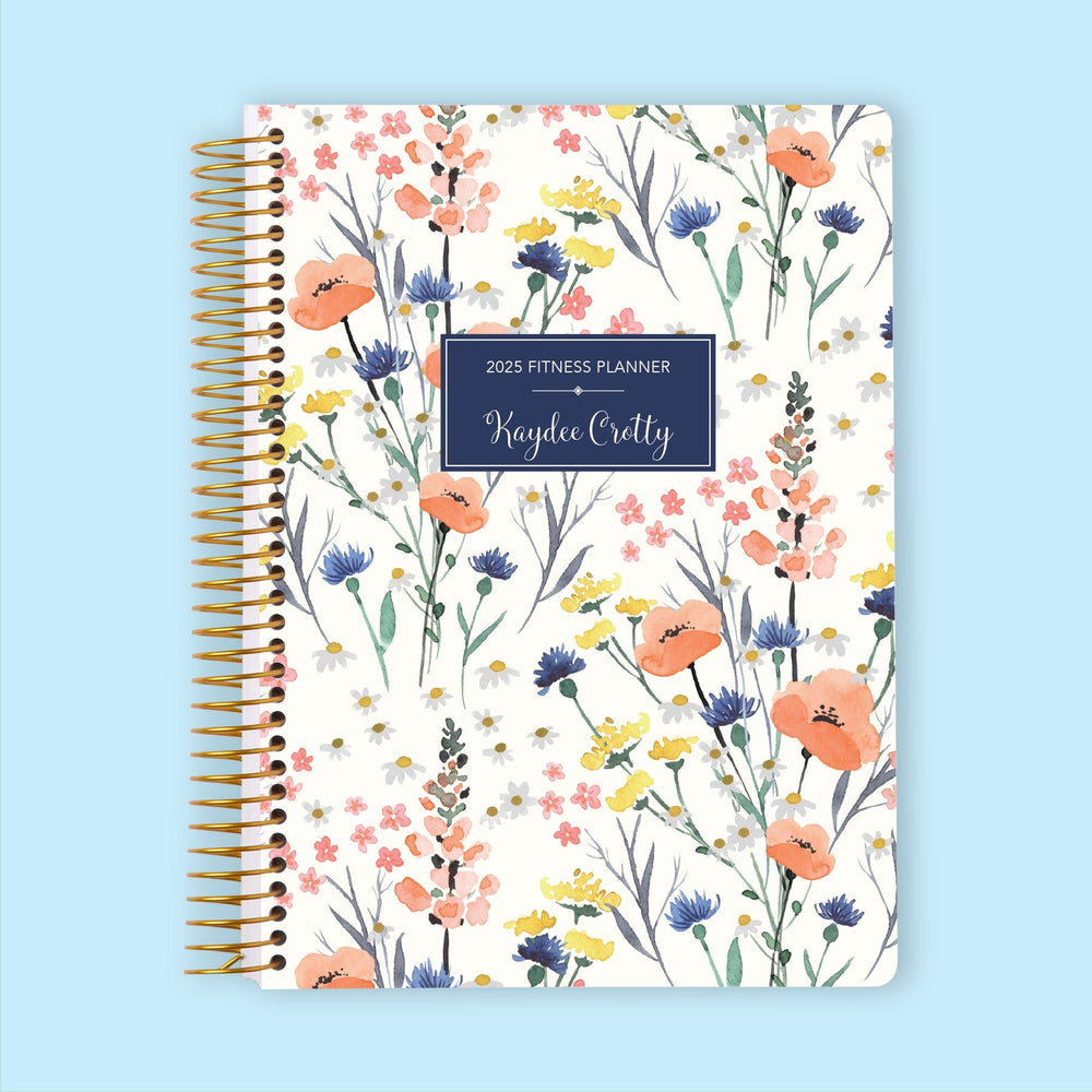 Fitness planner with a Field Flowers Blue cover, a calming and structured planner for meal planning, exercise routines, and self-care.