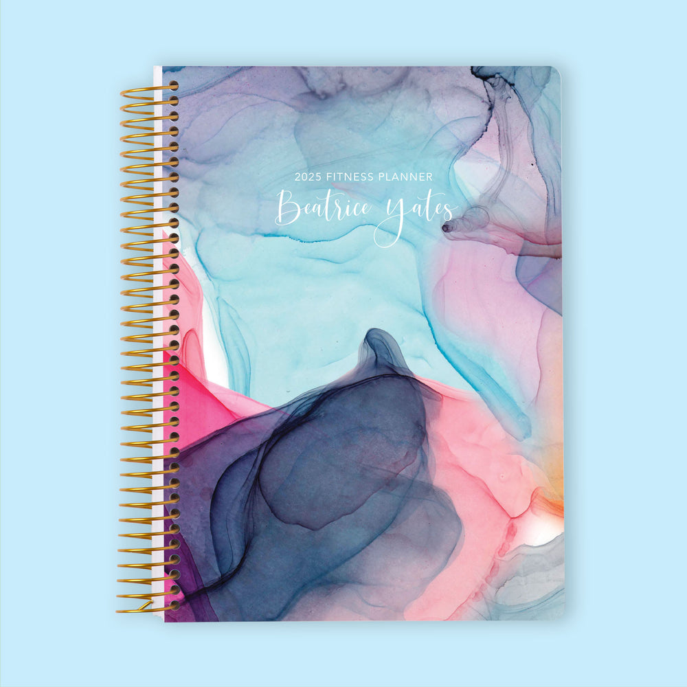 Fitness planner with a Multicolor Flowing Ink cover, a dynamic and vibrant planner for achieving fitness goals and wellness tracking.