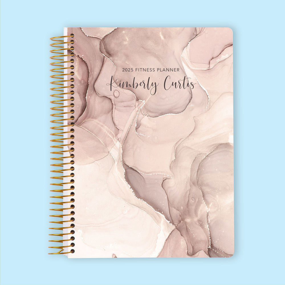 Fitness planner with a Neutral Abstract Ink cover, a minimalistic and structured planner for daily fitness goals and habits.