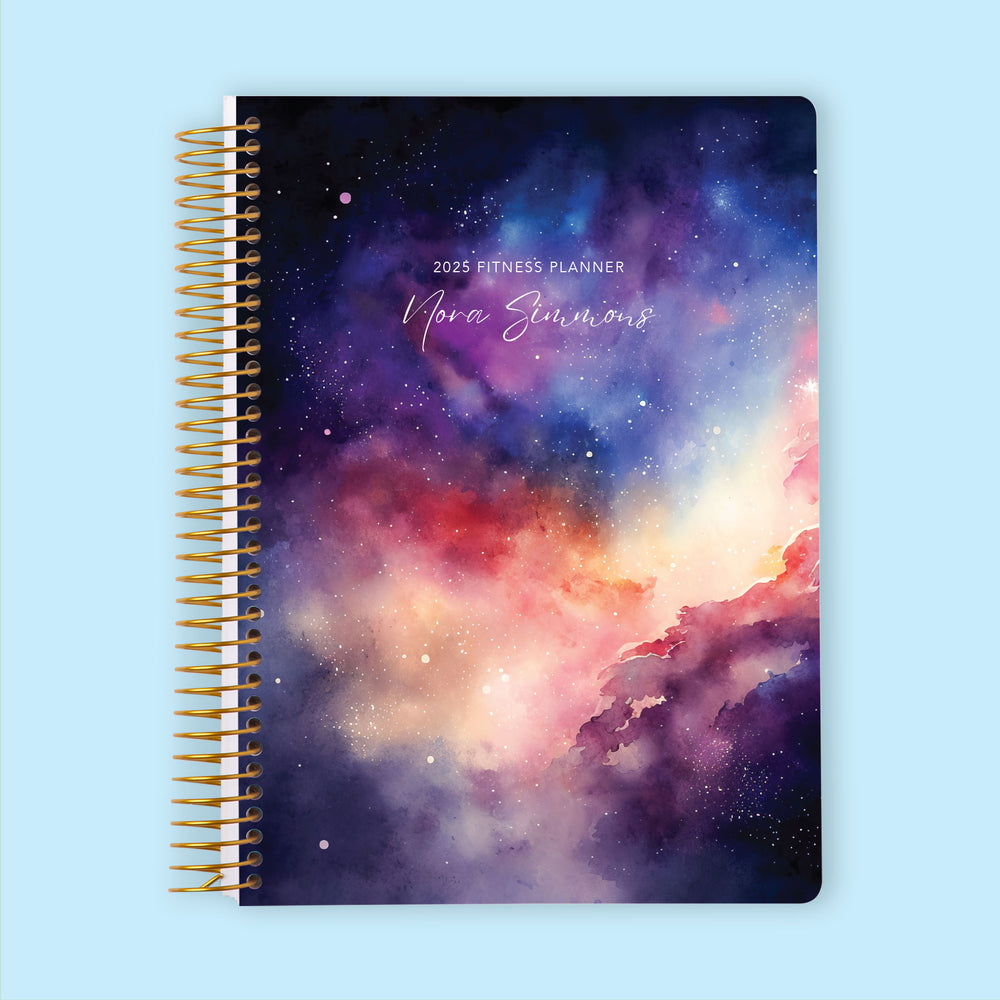 Fitness planner with a Space Galaxy Colorful cover, bringing cosmic inspiration to your workout and wellness planning.