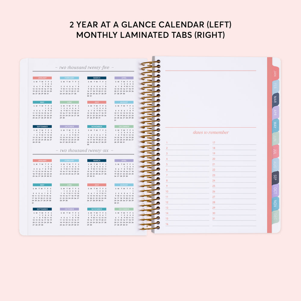 a planner with a calendar on top of it