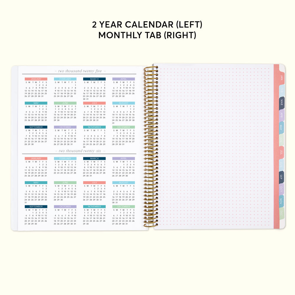 a planner with a calendar on top of it