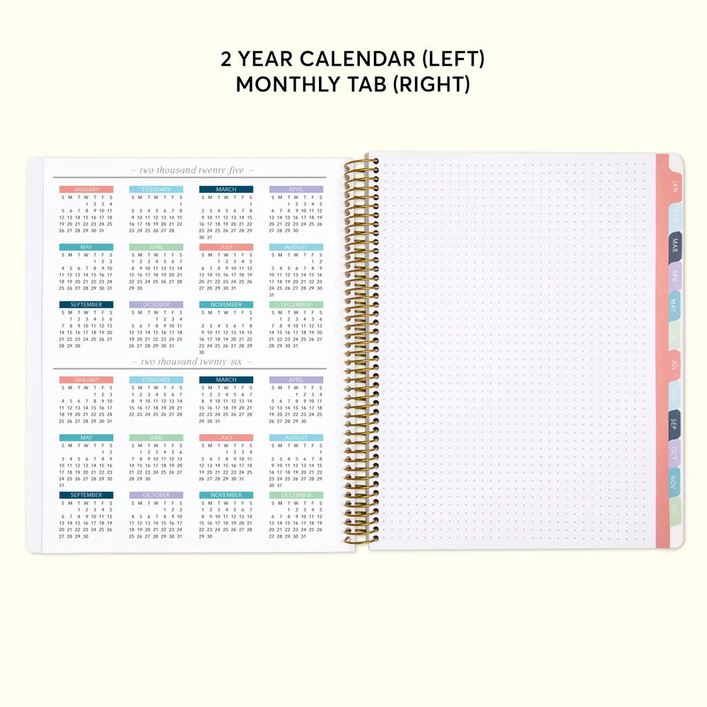 a planner with a calendar on top of it
