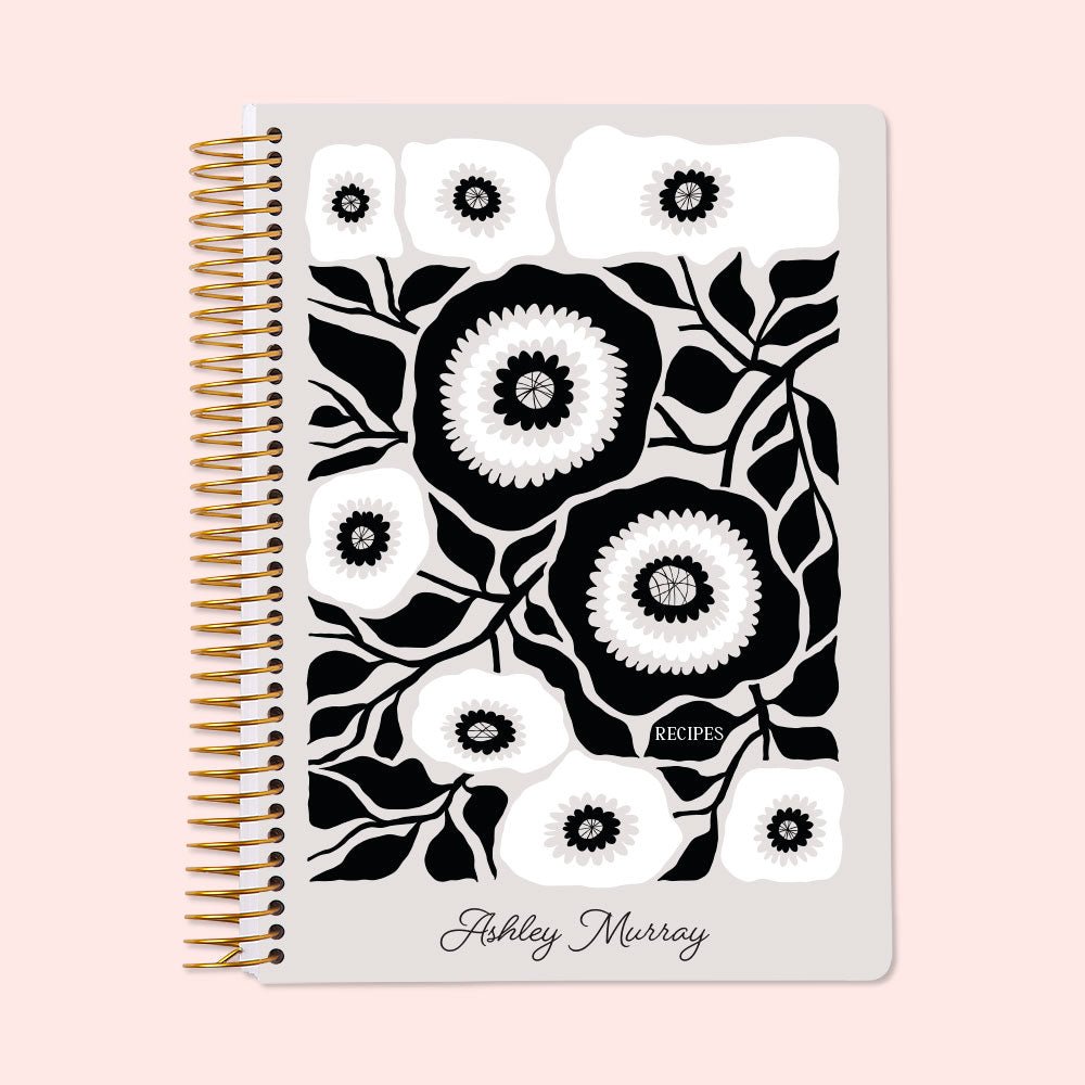 Personalized recipe book with an Artful Flowers Black and White cover, a minimalist yet elegant style for keeping track of special recipes and meal ideas.