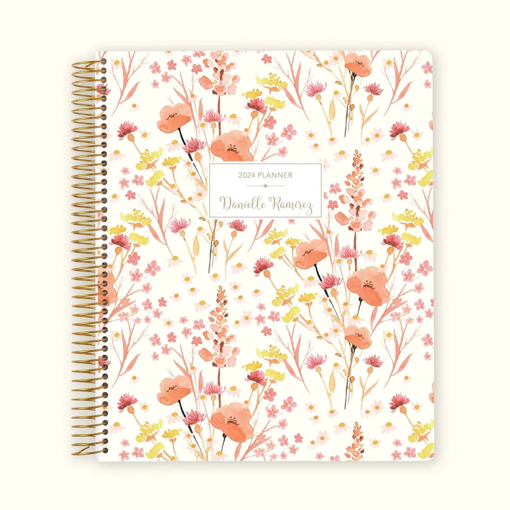 8.5x11 monthly planner with a soft field flowers pink cover, blending gentle floral tones with smooth paper and spacious monthly layouts for stress-free planning.