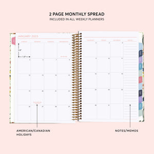 
                  
                    Two-page monthly calendar spread with a notes column and colored month tabs.
                  
                