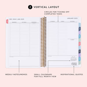 
                  
                    a spiral bound planner with the words vertical layout
                  
                