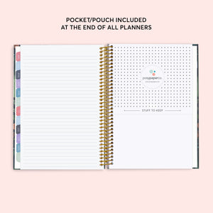 
                  
                    Lined notes page beside the planner's back pocket.
                  
                