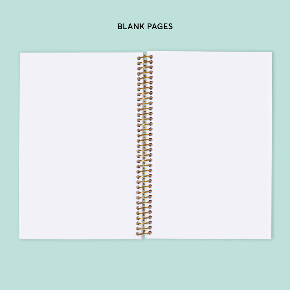 
                  
                    a blank spiral-bound notebook with a white cover against a light blue background.
                  
                