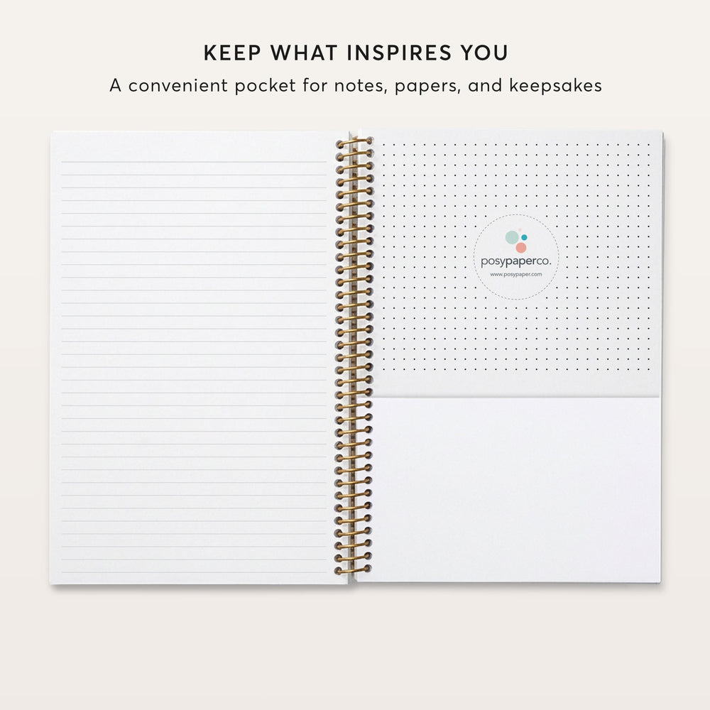 
                  
                    a spiral-bound notebook with a blank page and a pocket on the right side, which appears to be a convenient storage space for notes, papers, and keepsakes.
                  
                