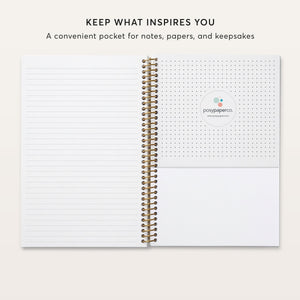 
                  
                    Lined notebook pages beside a pocket for loose notes and papers.
                  
                