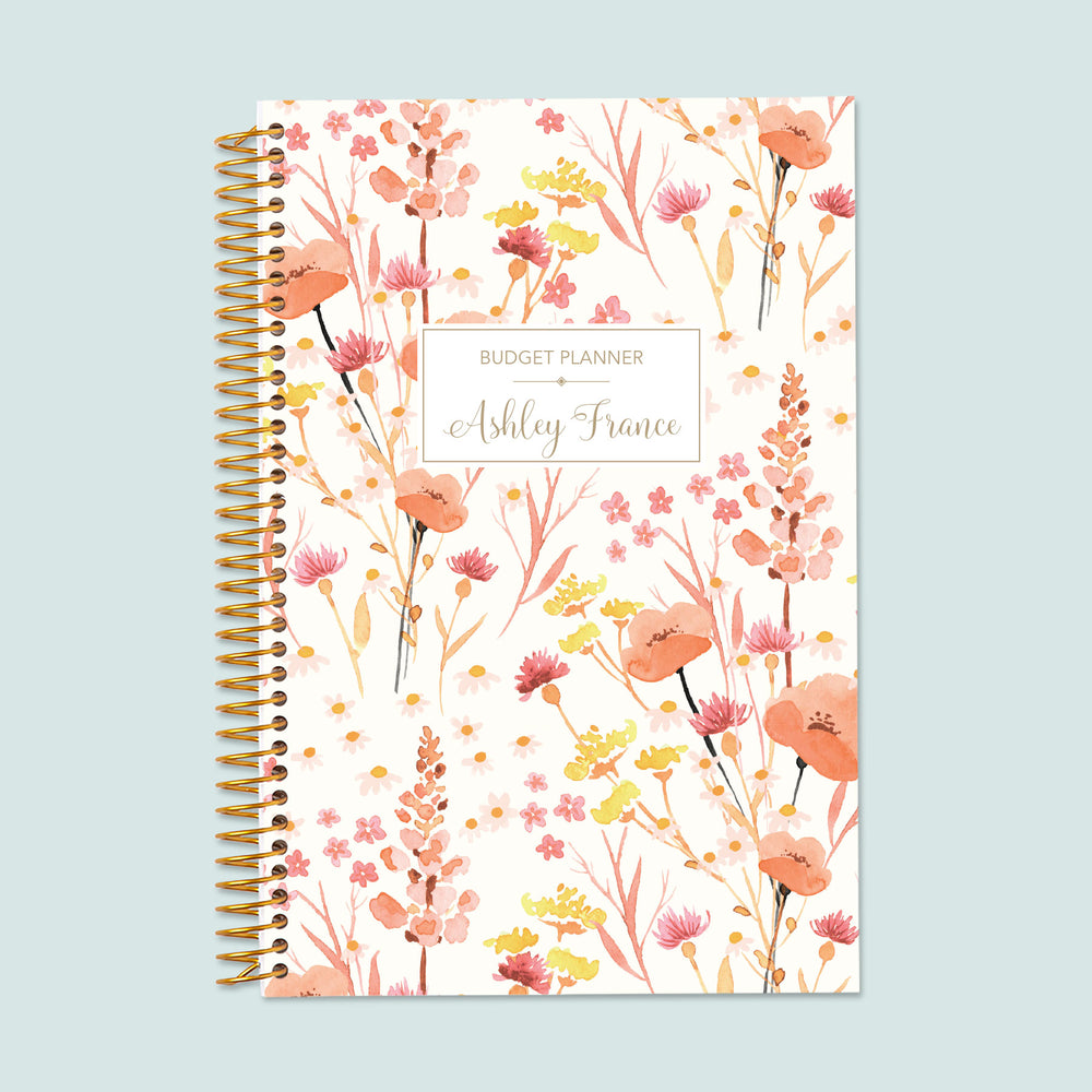 6x9 budget planner with a field flowers pink cover, a soft floral-inspired design, structured savings trackers, and durable pages for smart financial planning.
