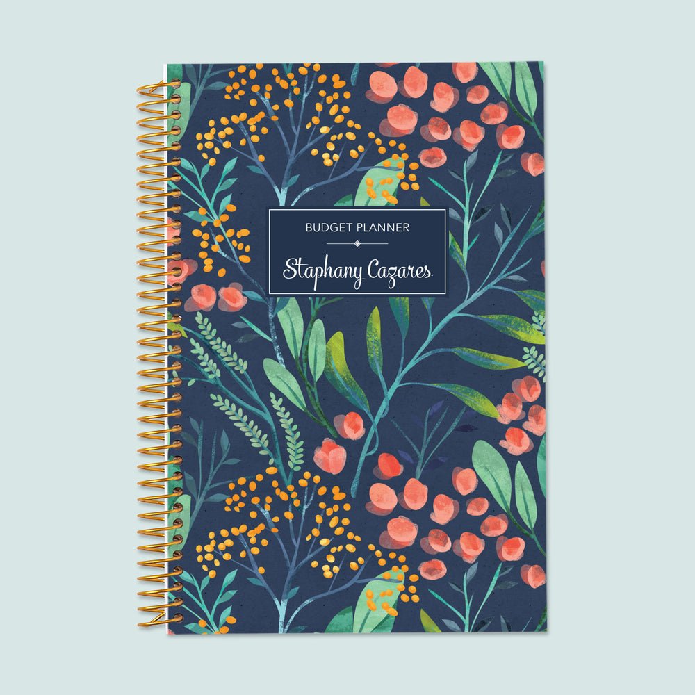 6x9 budget planner with a navy watercolor floral cover, featuring soft painted blossoms, durable binding, and easy-to-use finance tracking pages.
