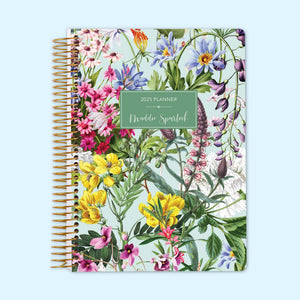 
                  
                    6×9 daily planner with a Colorful Florals Green cover and gold coil binding.
                  
                