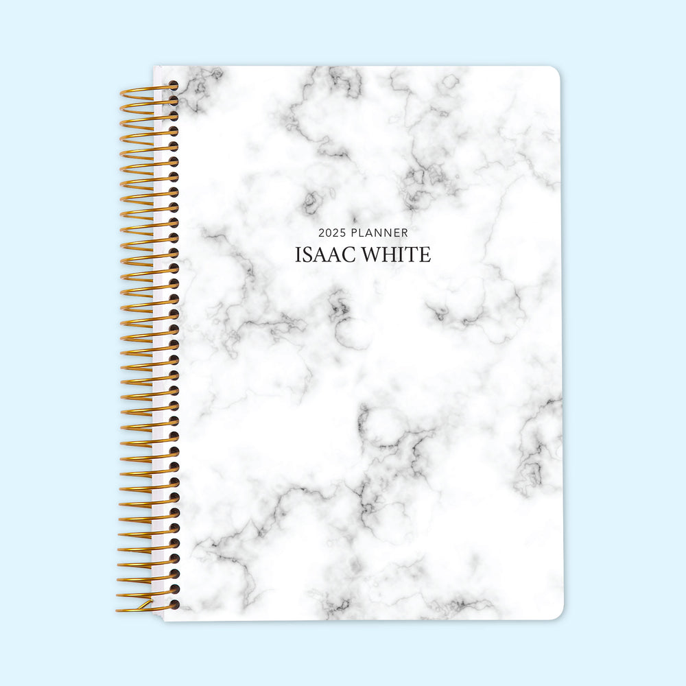 Daily planner with a sophisticated gray marble cover, including structured daily planning pages and customizable personal details for a polished, organized schedule.