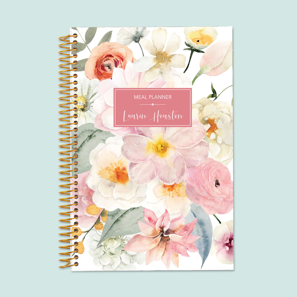 6x9 meal planner with a Flirty Florals Blush cover, blending beauty with functionality for effortless weekly meal tracking and grocery planning.