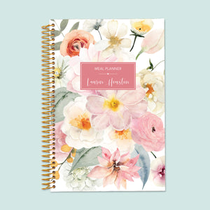 
                  
                    6x9 meal planner with a Flirty Florals Blush cover, blending beauty with functionality for effortless weekly meal tracking and grocery planning.
                  
                