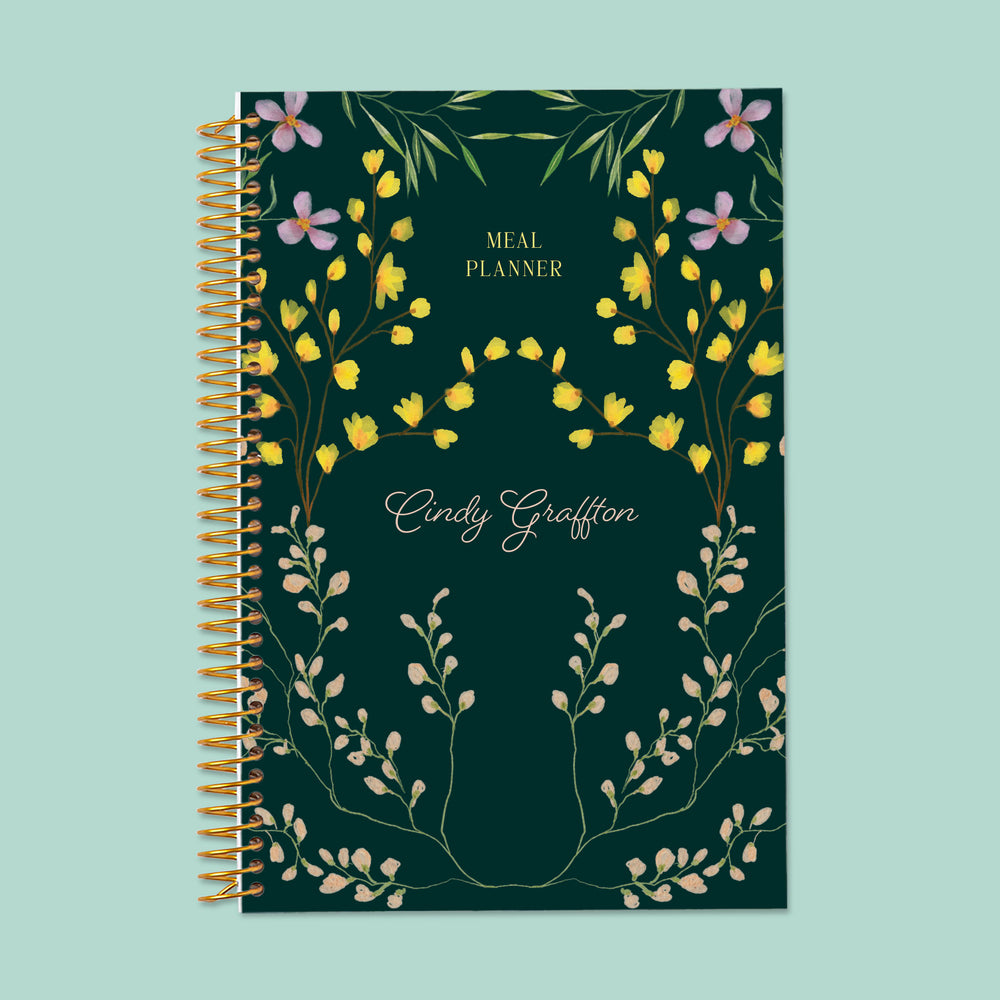 6x9 meal planner with a Flower Frame Green cover, offering dedicated pages for meal prepping, nutrition tracking, and planning grocery lists in one place.