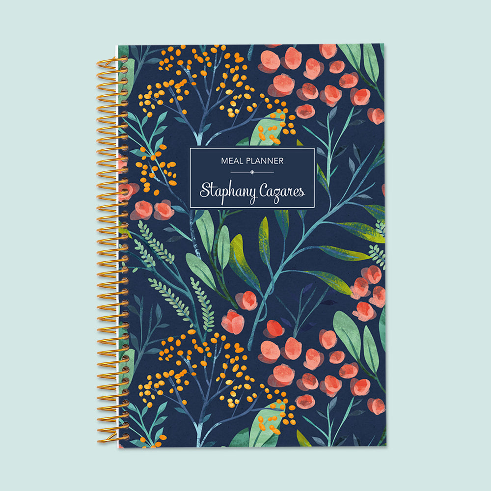 6x9 meal planner with a Navy Watercolor Floral cover, combining aesthetics and practicality with structured pages for meal scheduling and grocery lists.