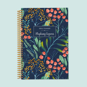 
                  
                    6x9 meal planner with a Navy Watercolor Floral cover, combining aesthetics and practicality with structured pages for meal scheduling and grocery lists.
                  
                