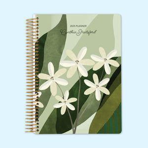 
                  
                    Monthly planner featuring a vibrant green abstract floral cover. A blend of artistic florals and structured layouts for seamless organization.
                  
                