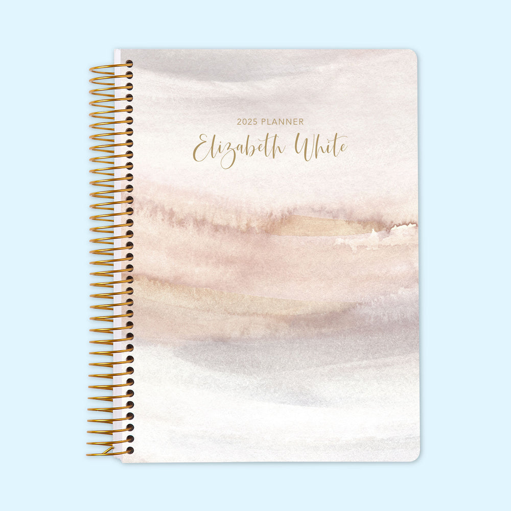 Monthly planner with a calming neutral watercolor gradient cover. A minimal yet elegant planner designed for daily structure.