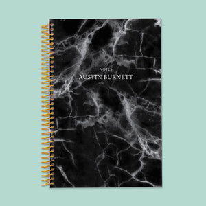 
                  
                    Classic black marble notebook with premium paper and a sleek, professional design for notes, journaling, and organization.
                  
                