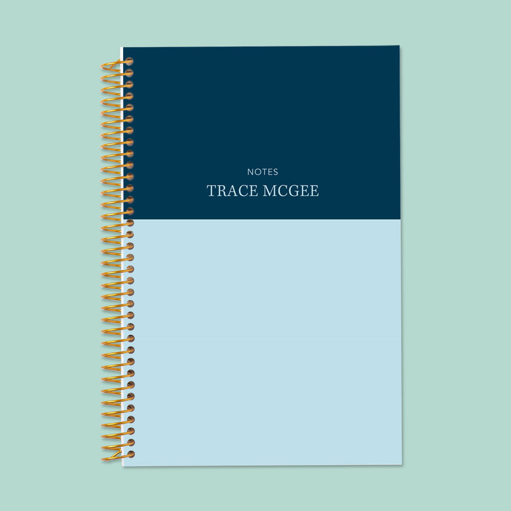 Modern blue and navy color block notebook with a smooth writing surface, ideal for planning and creative notes.