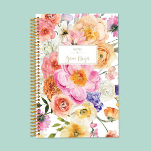 
                  
                    6×9 notebook with a Flirty Florals Colorful cover and gold coil binding.
                  
                