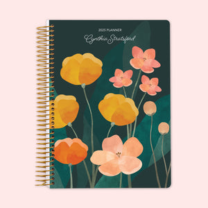 
                  
                    Weekly planner with a vibrant abstract floral cover in green tones with multicolor accents, complete with a durable spiral binding and personalized cover text to keep you organized and inspired.
                  
                