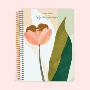 
                  
                    Weekly planner with a bold abstract floral cover showcasing an array of multicolor blooms, secured by a sturdy coil binding and customizable with your name—perfect for staying organized and stylish.
                  
                