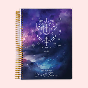 
                  
                    Weekly planner featuring an Aries zodiac cover with a cosmic purple backdrop and the Aries ram symbol, equipped with a durable spiral binding and personalized name on the cover — perfect for staying organized and inspired by the stars.
                  
                