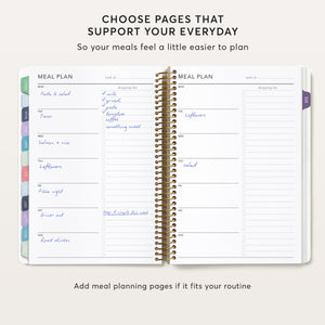 
                  
                    Optional meal-planning pages showing handwritten meals across a two-week spread.
                  
                